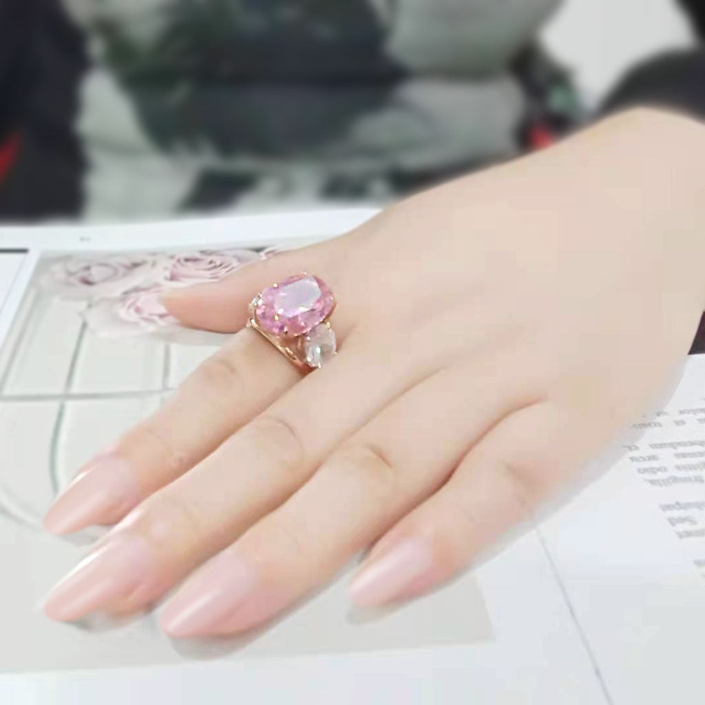 Three Stone Pink and Clear Cubic Zirconia Ring In Rose Gold